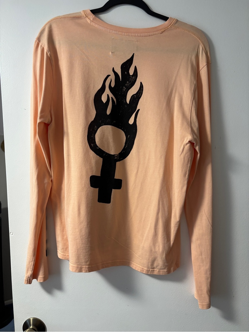 CHNGE Bright Peach Long-Sleeve Top with Black Flame Venus Graphic
